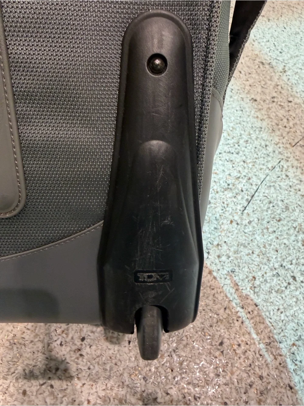 Tumi Alpa Bravo Series Gray/Black Upright Rolling Carry-On